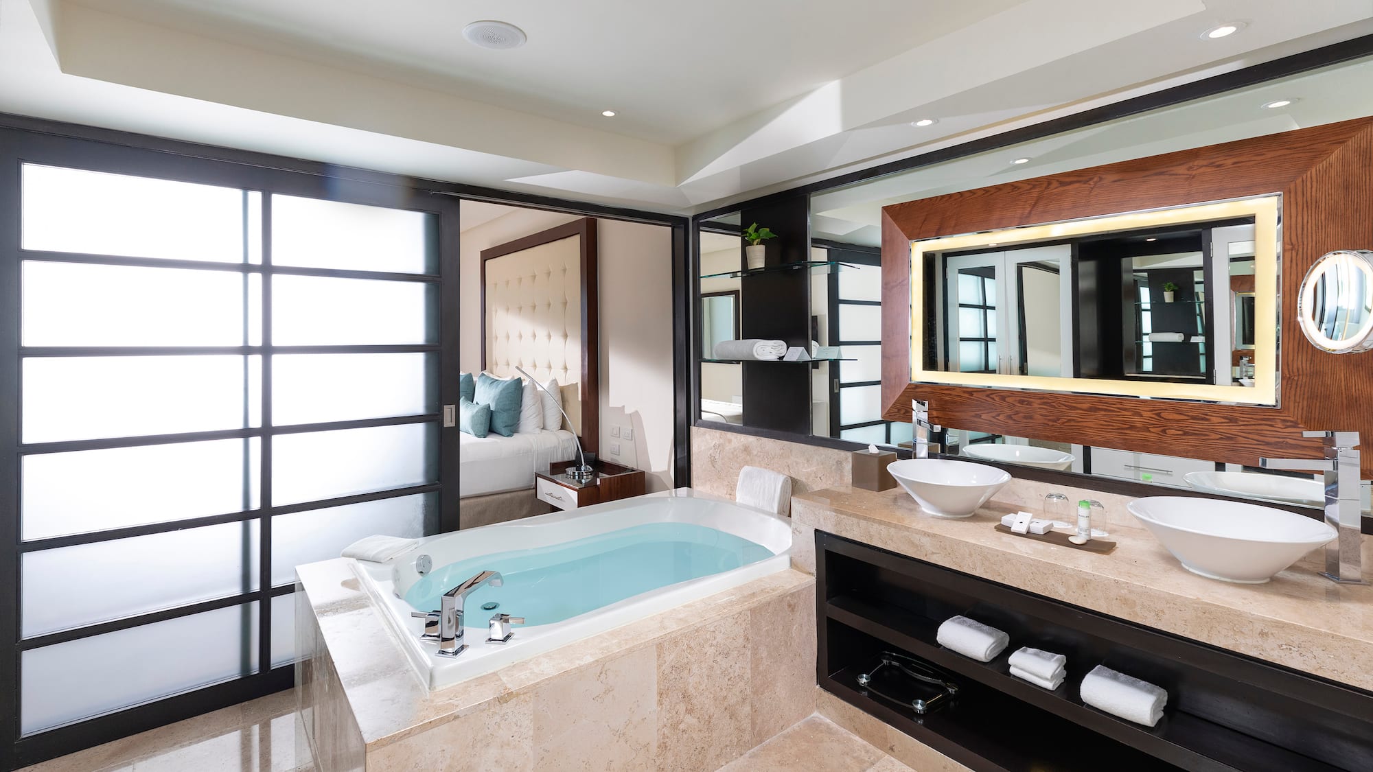 a bathroom with a tub and sink