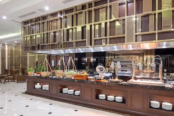 a buffet with food on the counter