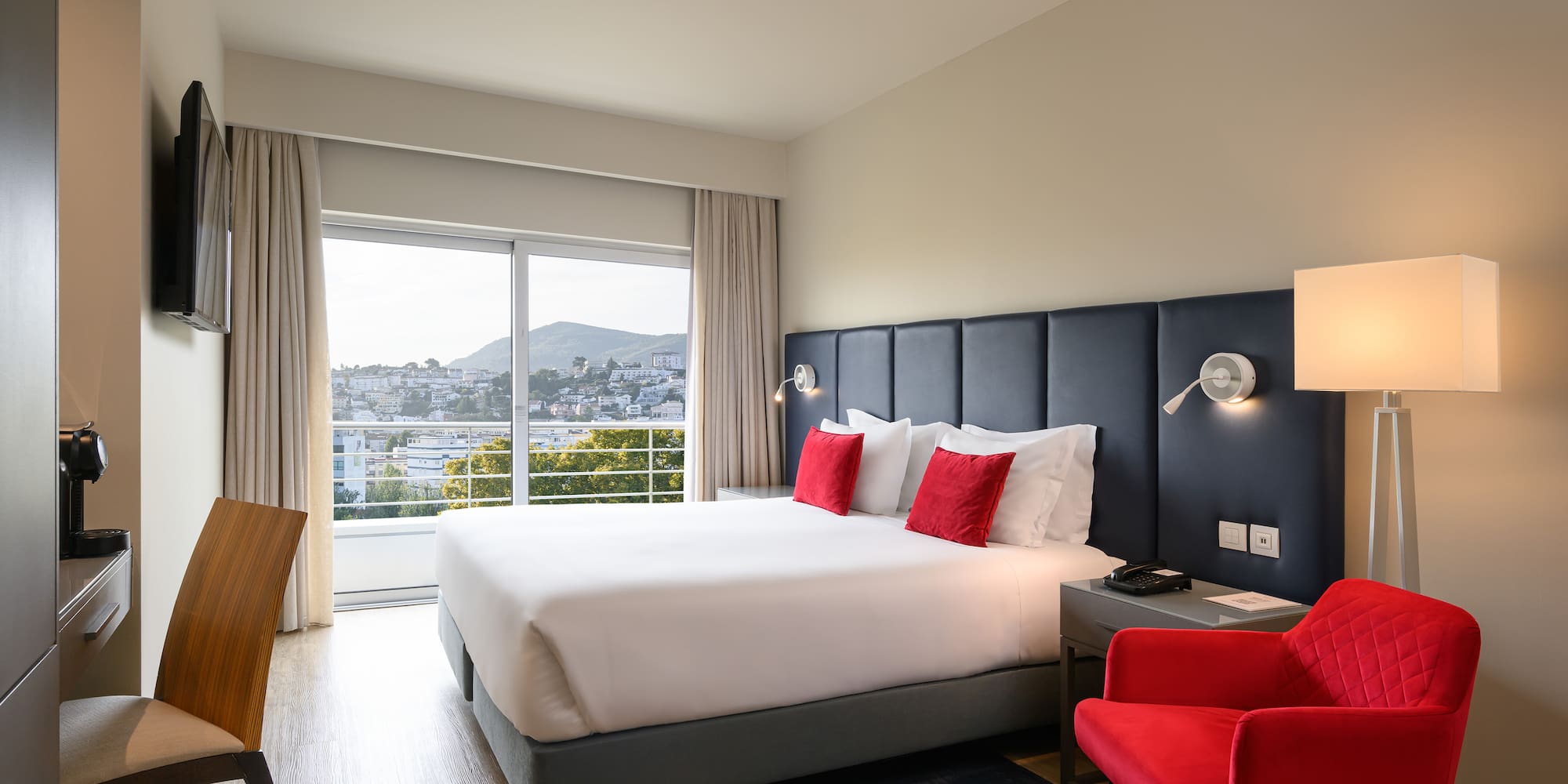 a room with a bed and a chair