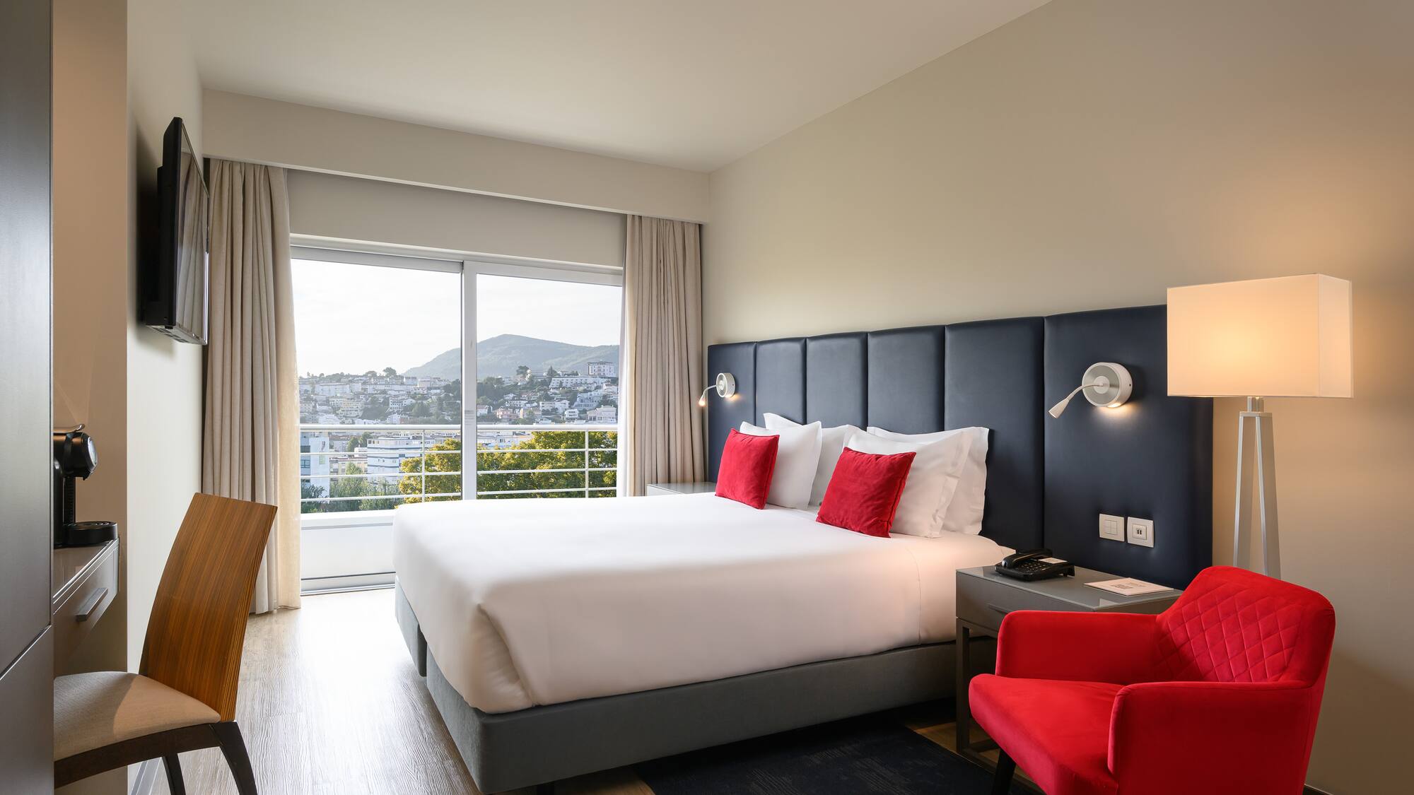 a room with a bed and a chair