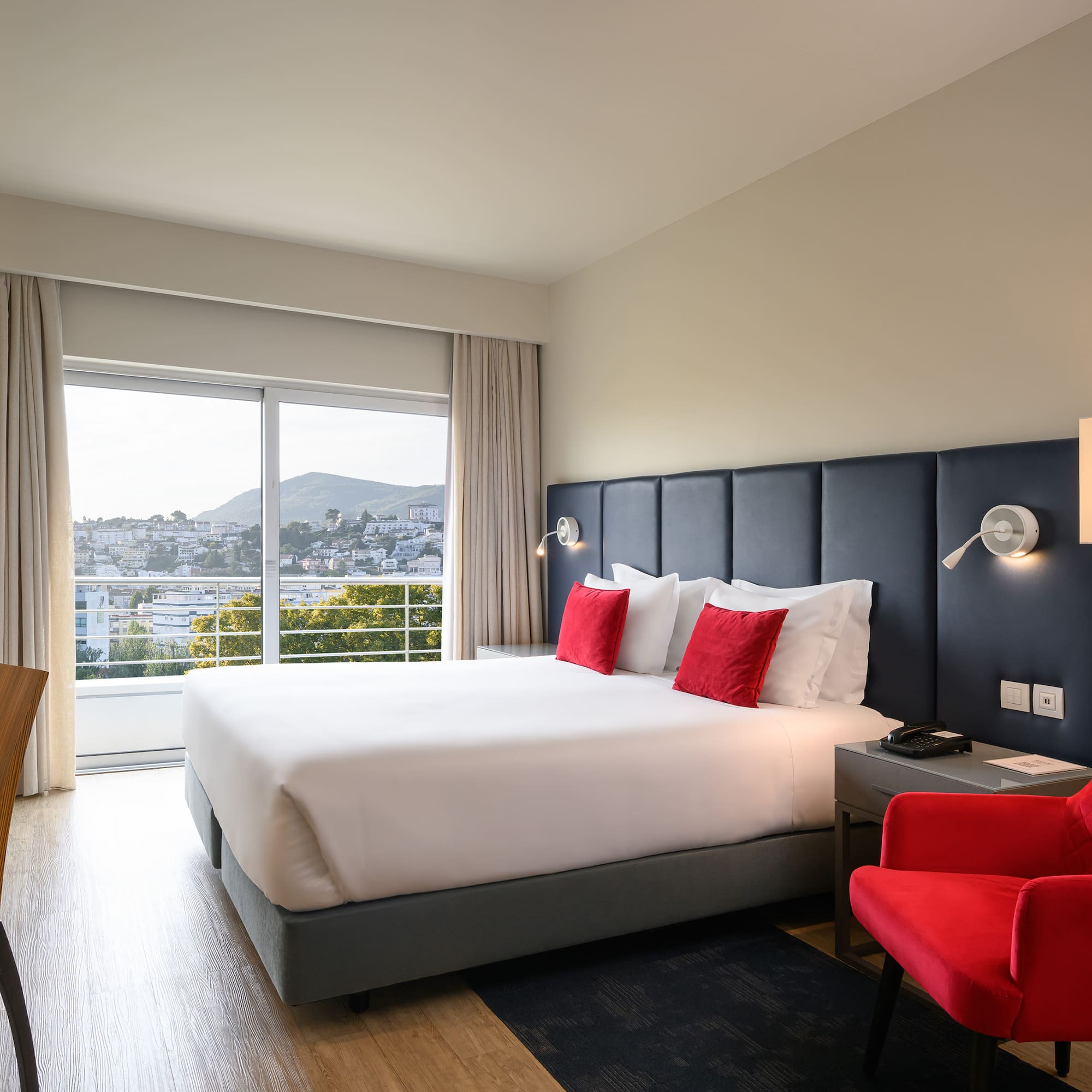 a room with a bed and a chair