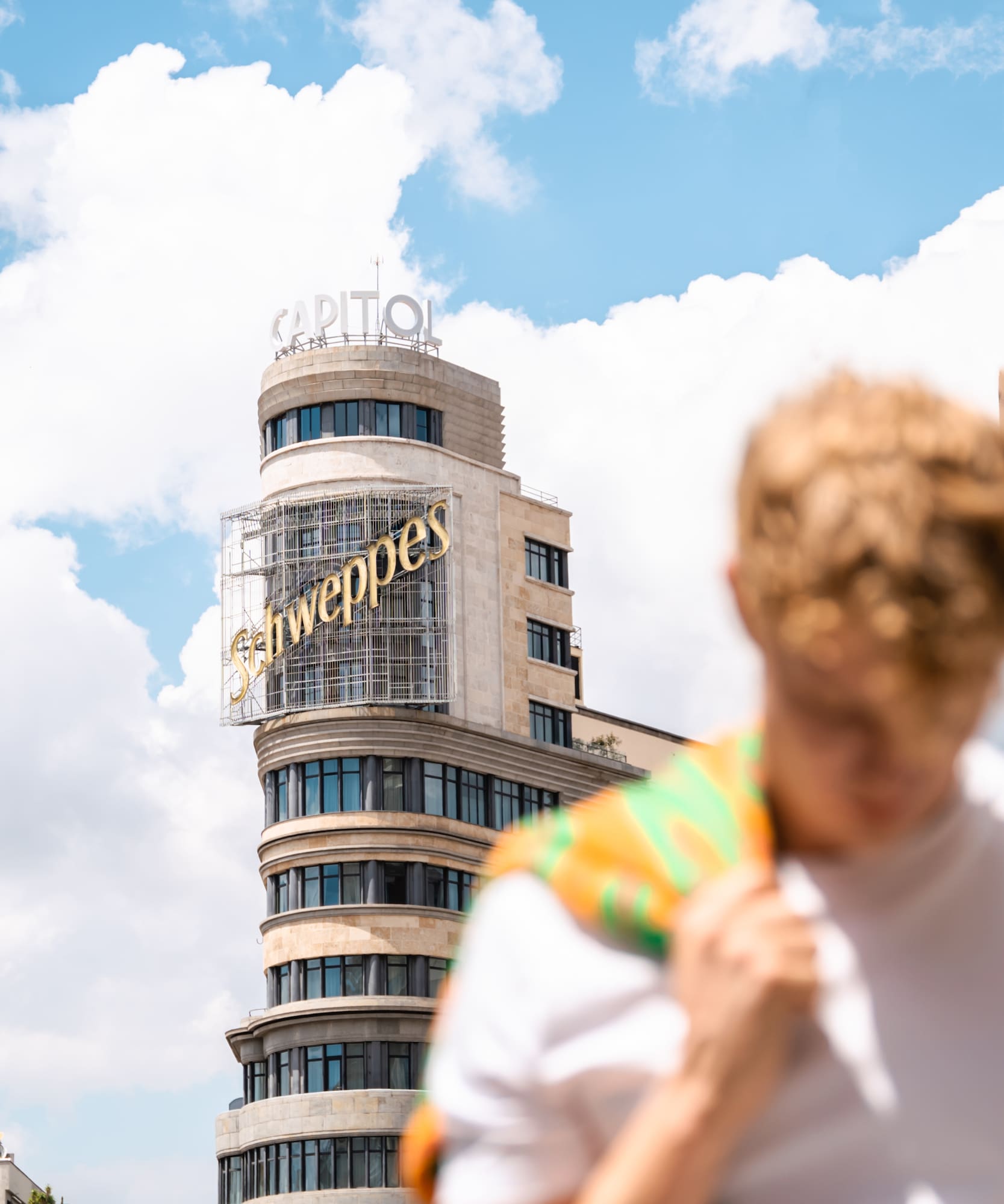a man in front of a building