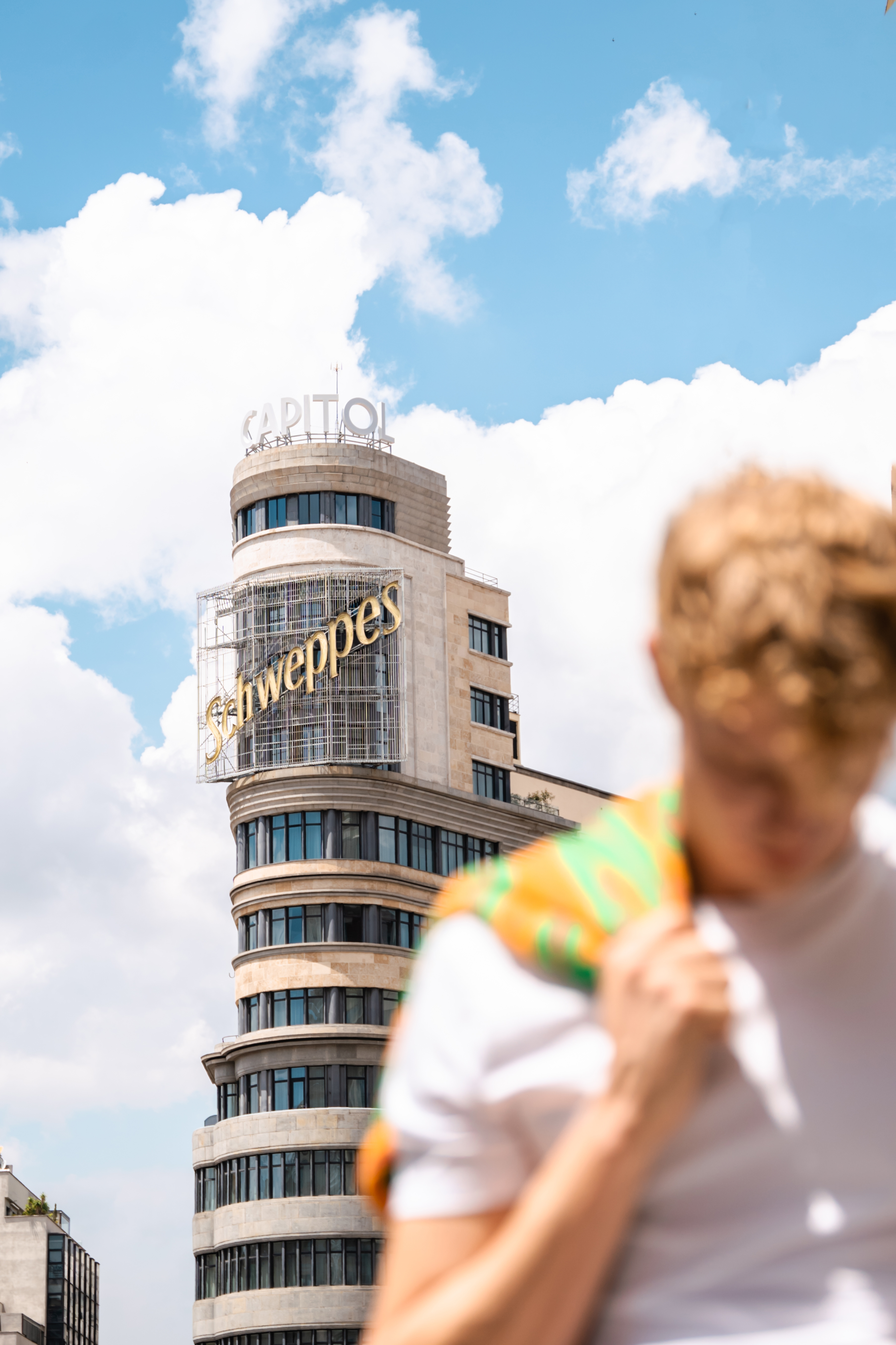 a man in front of a building