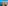 Lido di Venezia cityscape: red-roofed buildings, historic dome, blue lagoon.