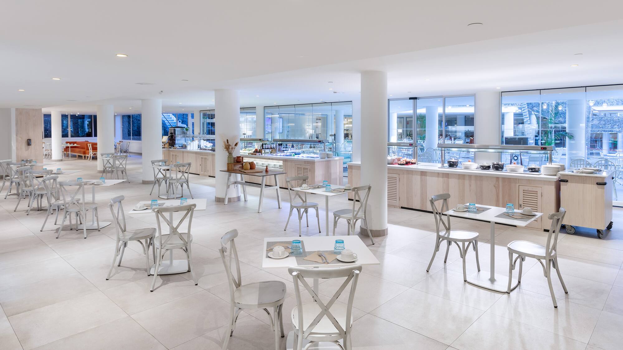 a large room with tables and chairs