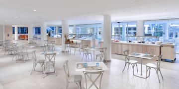 a large room with tables and chairs