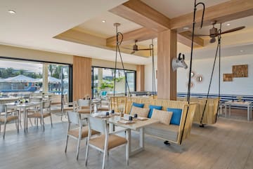 a room with a table and chairs