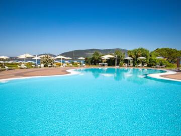 a pool with umbrellas and chairs