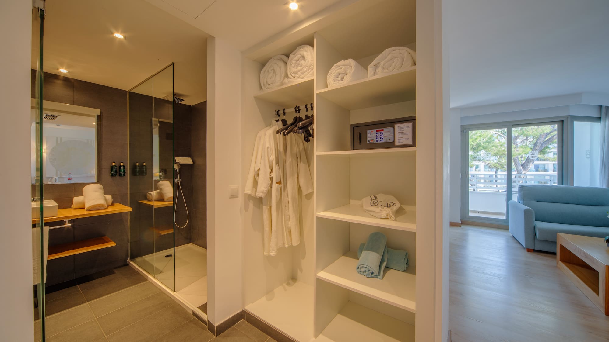 a bathroom with a shower and towels