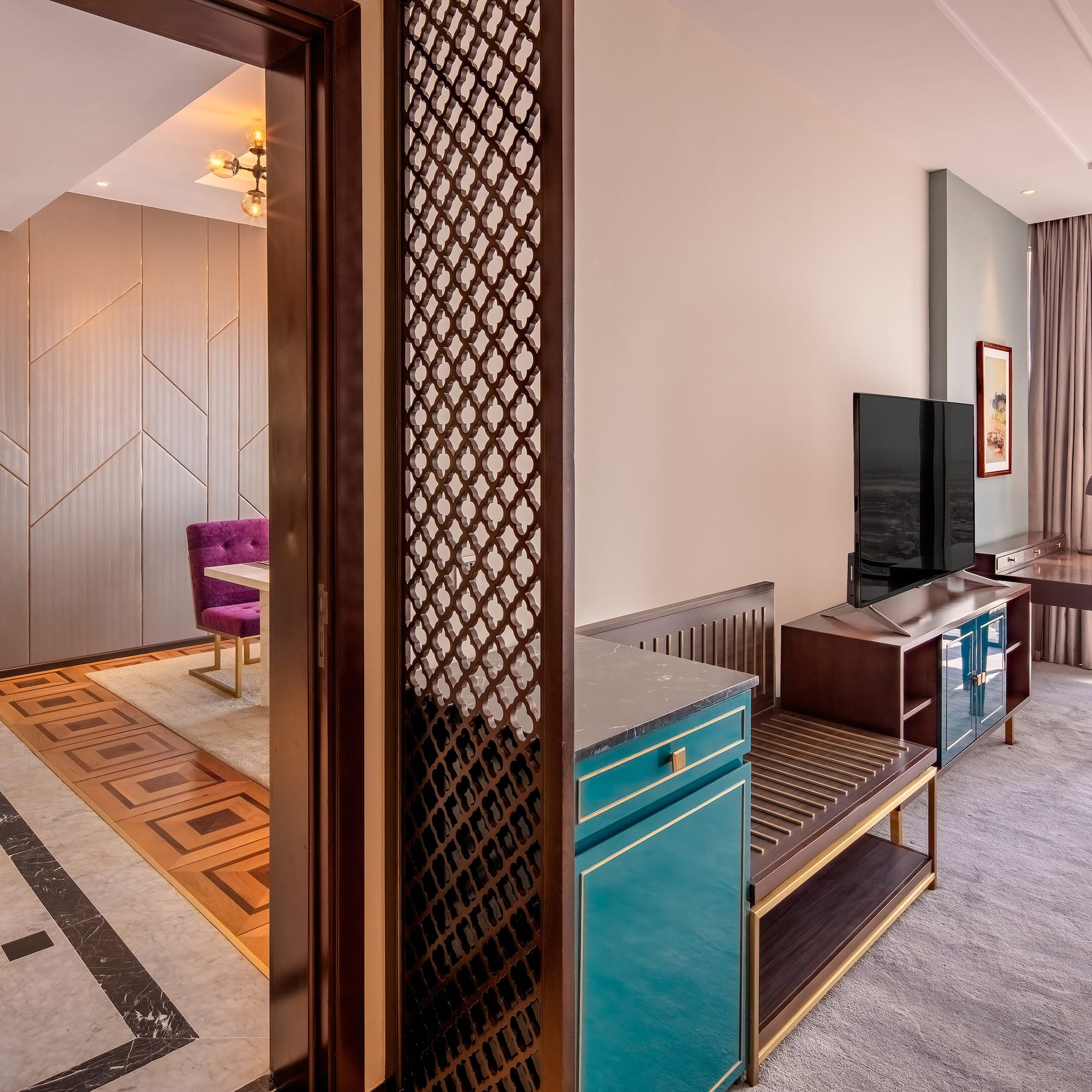 a room with a tv and a table