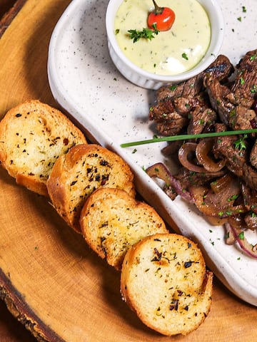 a plate of food on a wood surface
