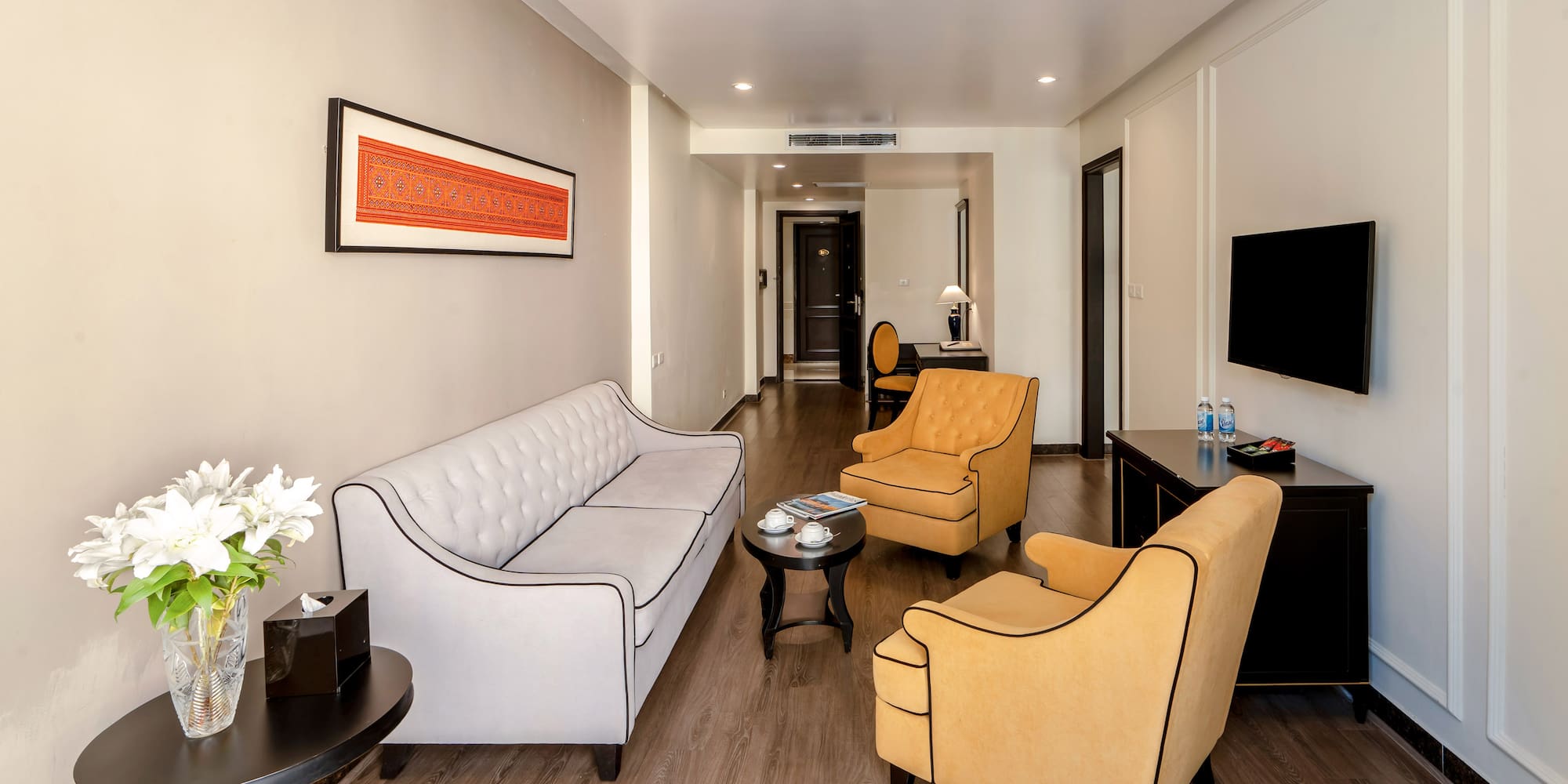 a room with couches and a table