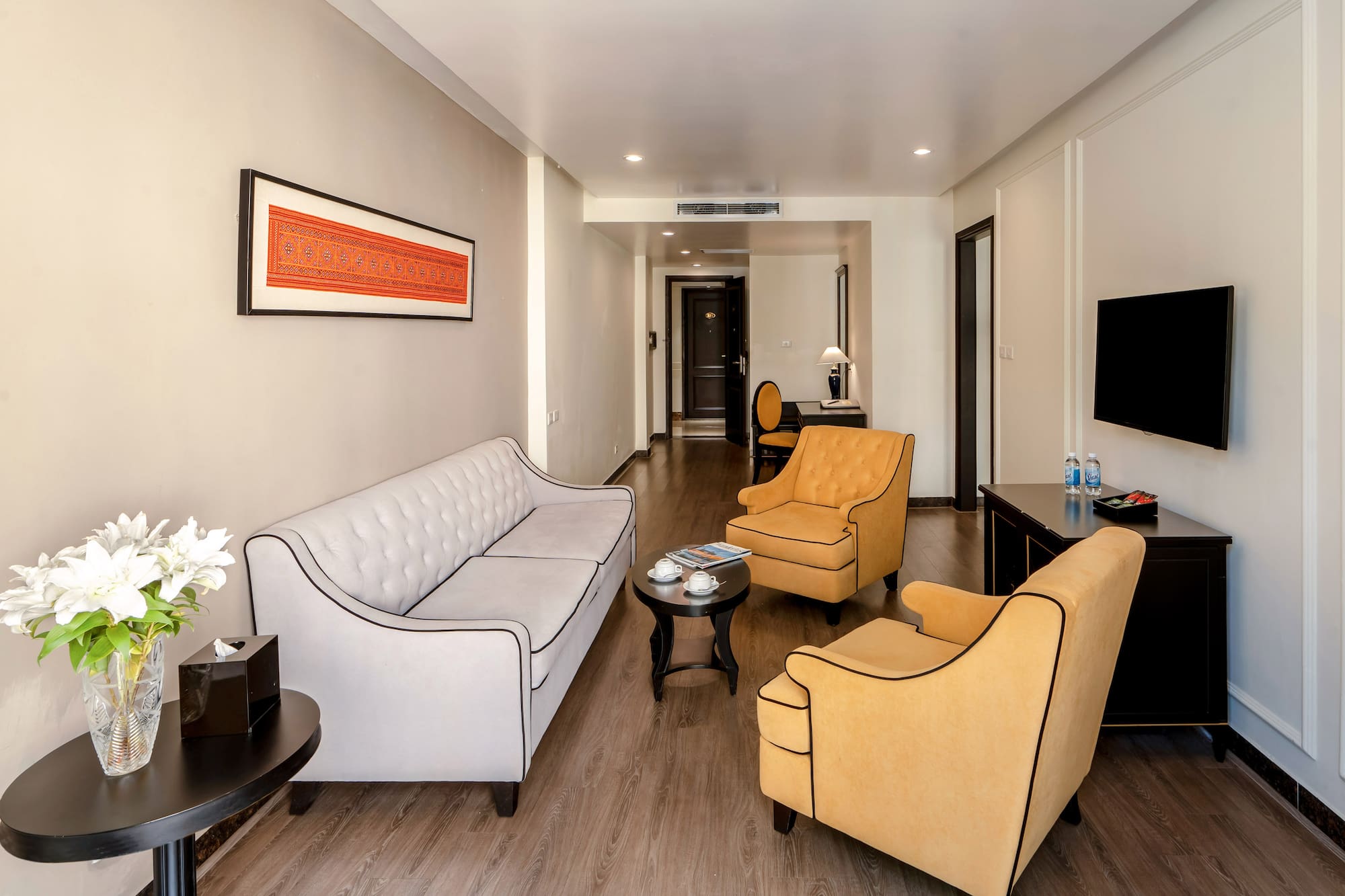 a room with couches and a table