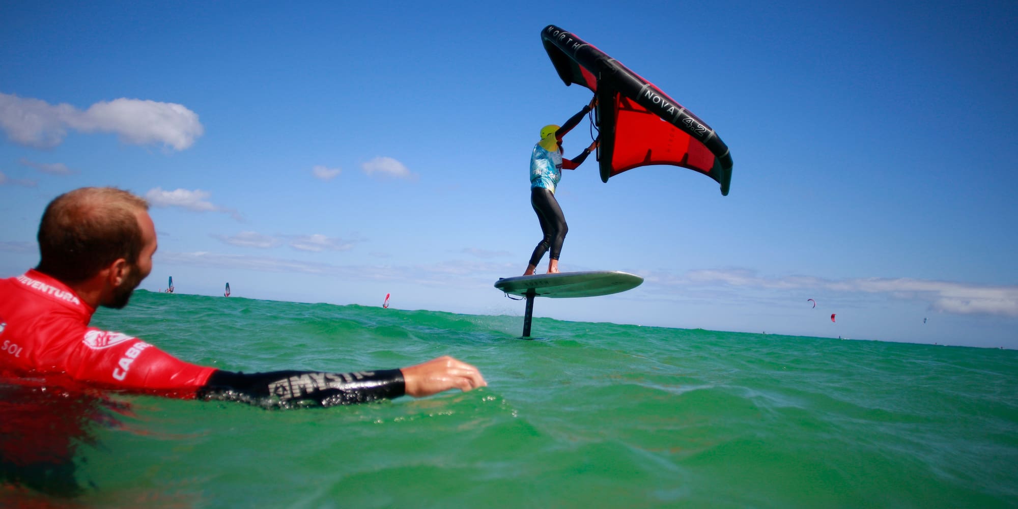 a person on a surfboard in the water