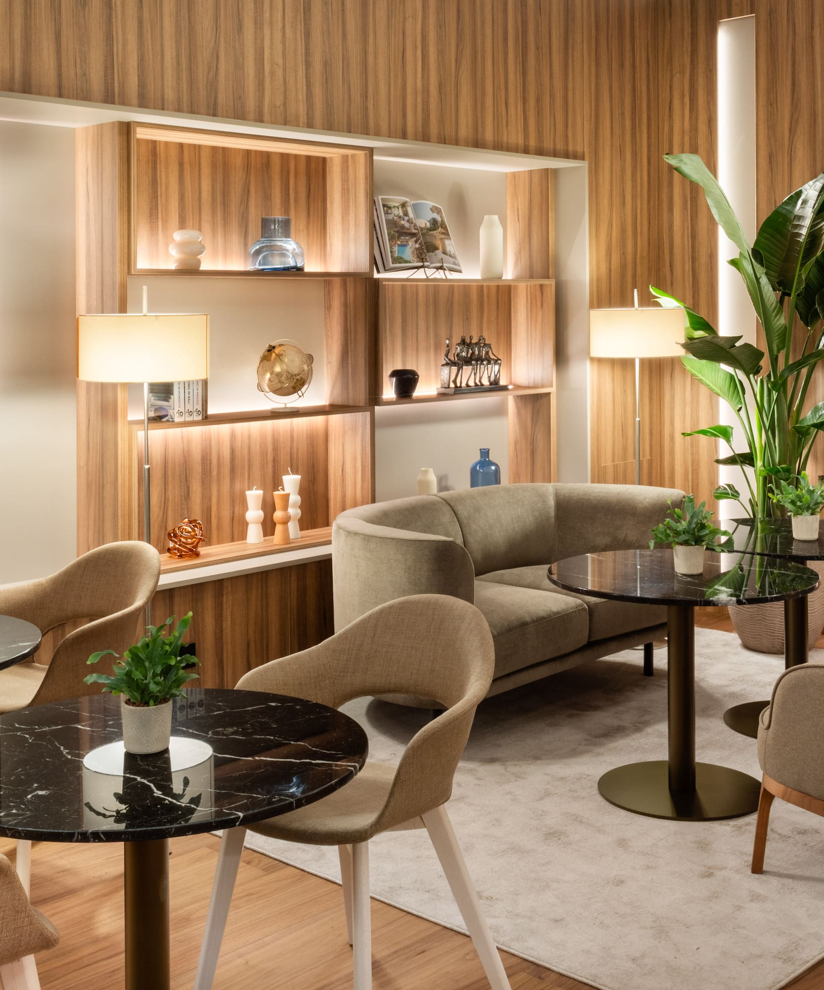 a room with a couch and tables