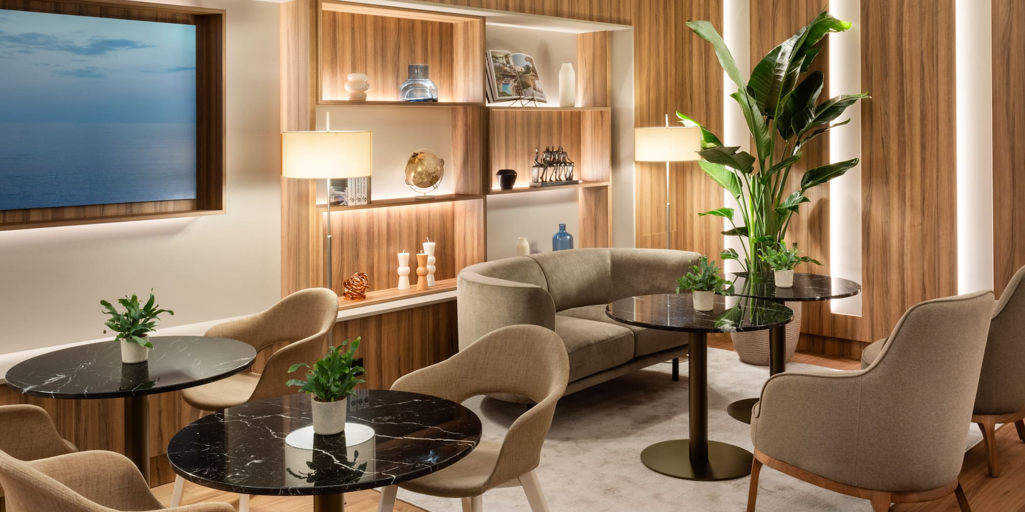 a room with a couch and tables