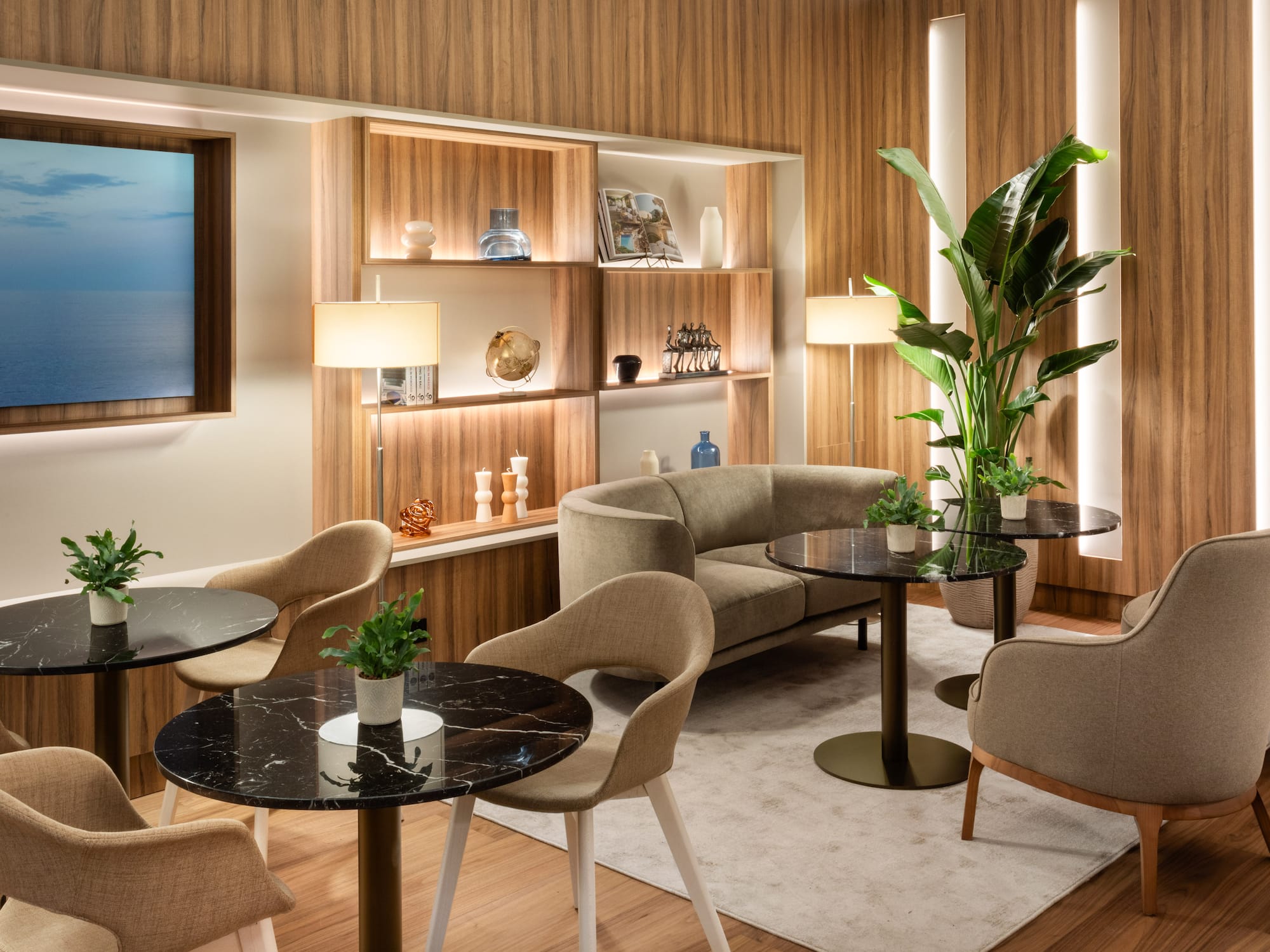 a room with a couch and tables