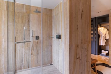 a shower with glass doors