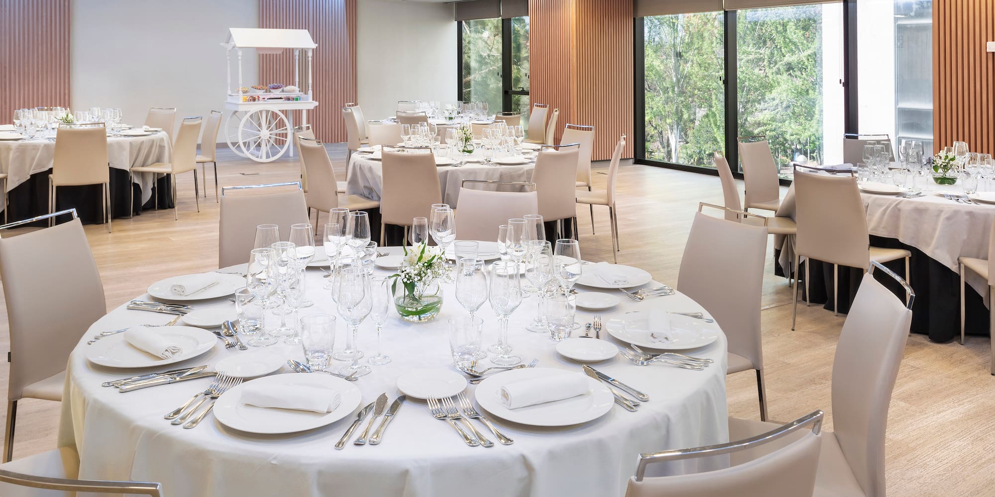 a room with tables and chairs