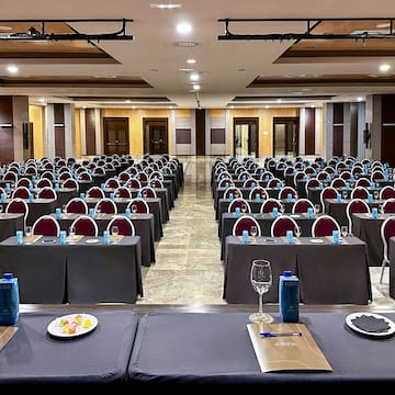 a room with tables and chairs