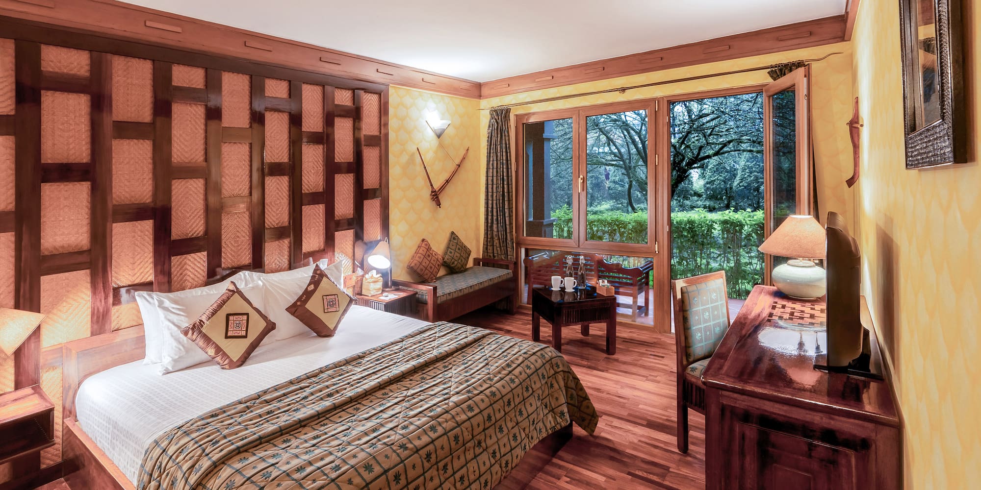 a bedroom with a bed and a desk