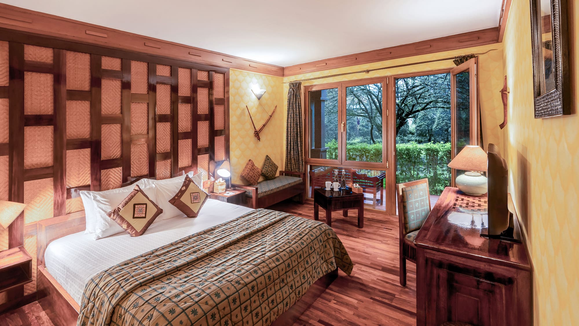 a bedroom with a bed and a desk