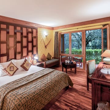 a bedroom with a bed and a desk