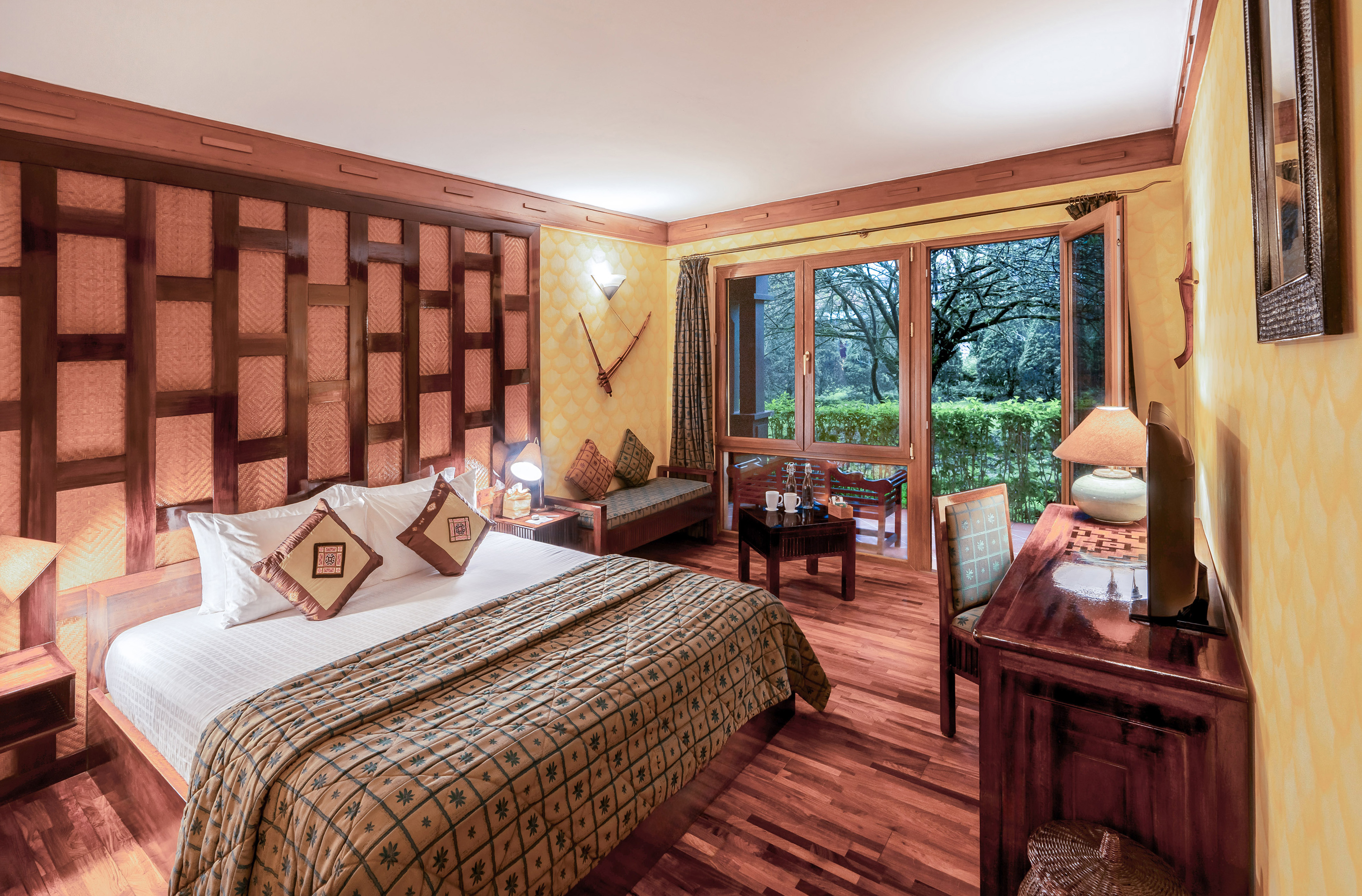 a bedroom with a bed and a desk