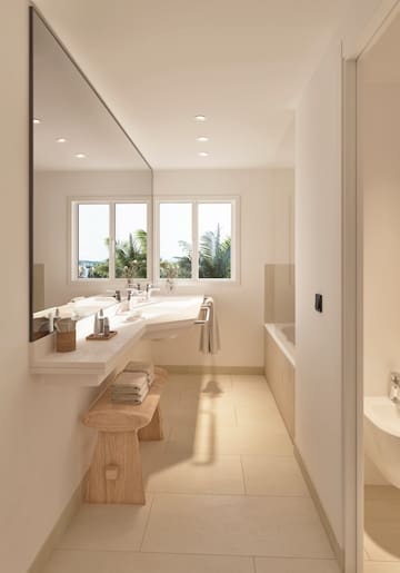 a bathroom with a large mirror