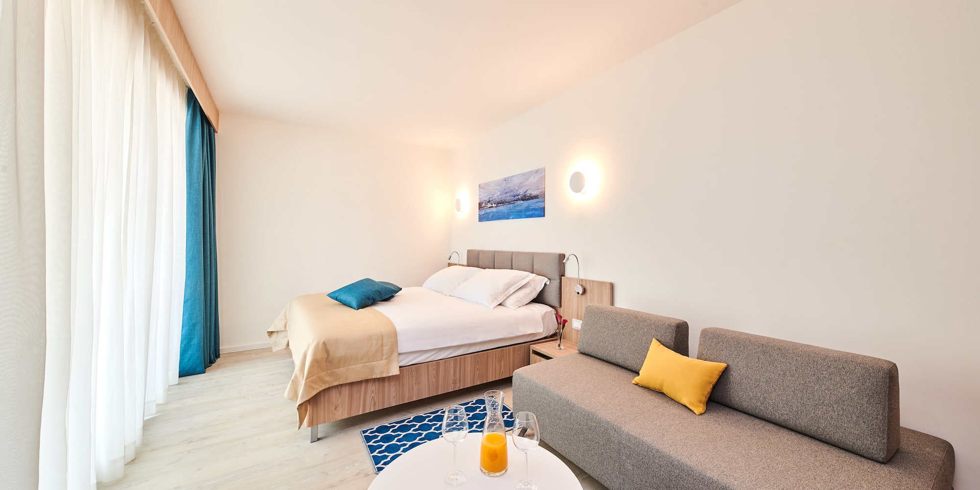 a room with a bed and a couch