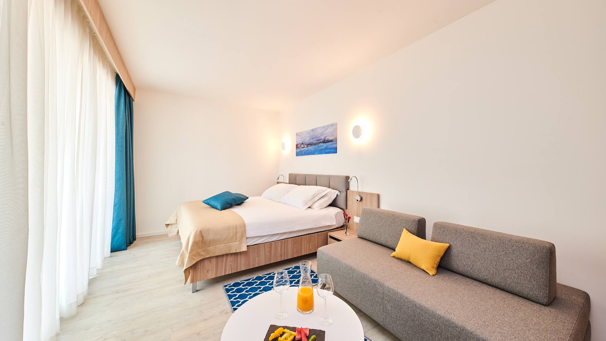 a room with a bed and a couch