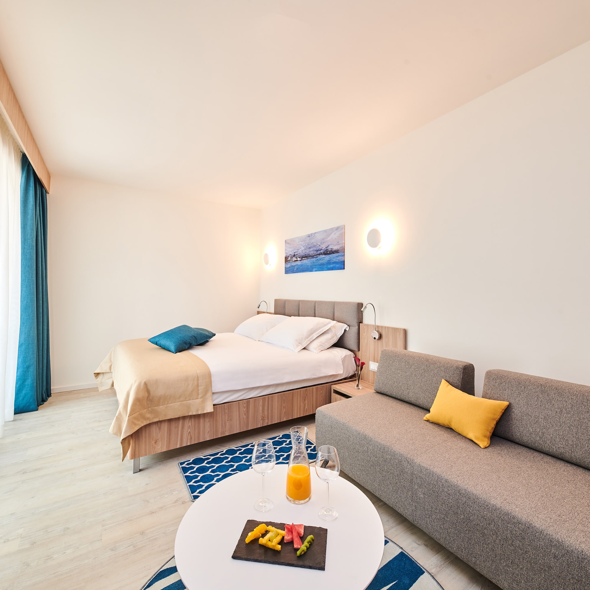 a room with a bed and a couch