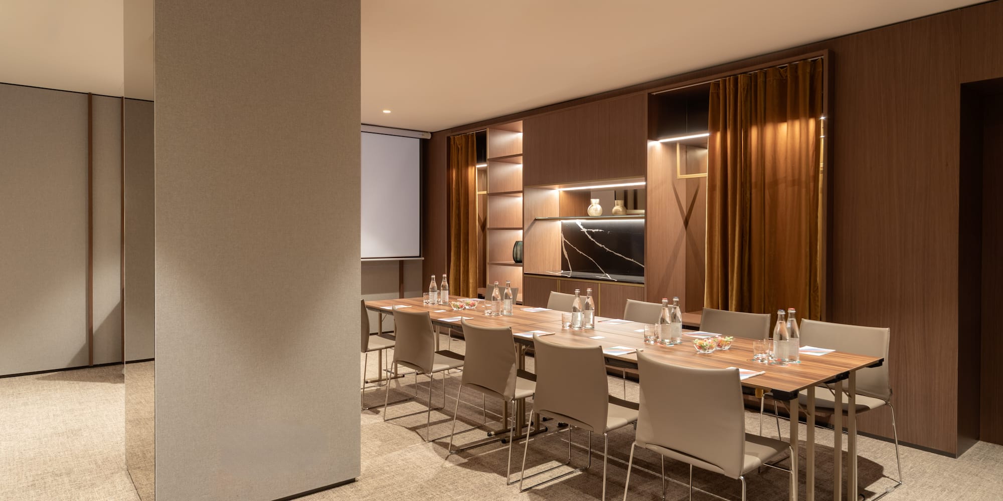 a room with a table and chairs