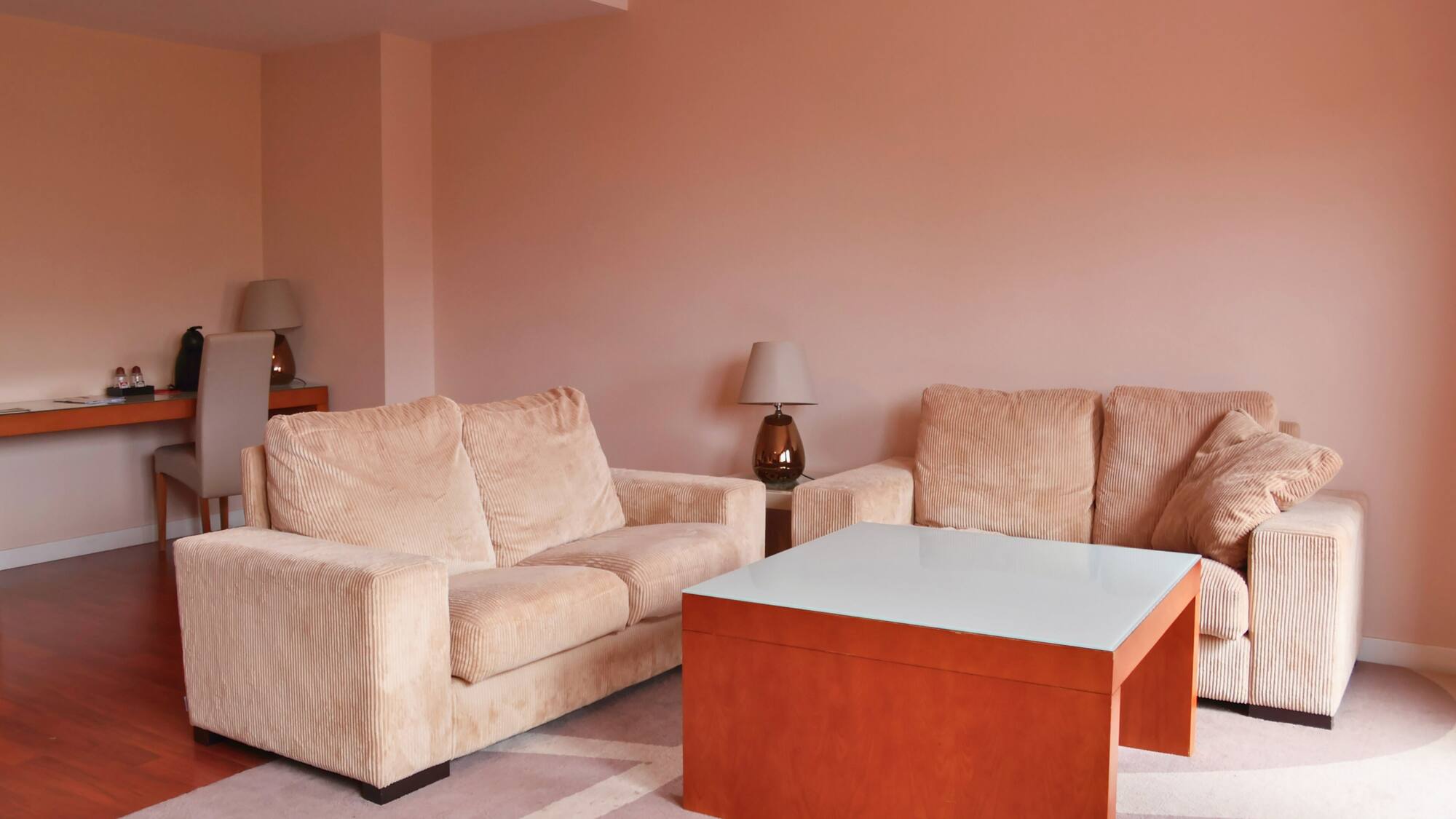 a living room with couches and a coffee table