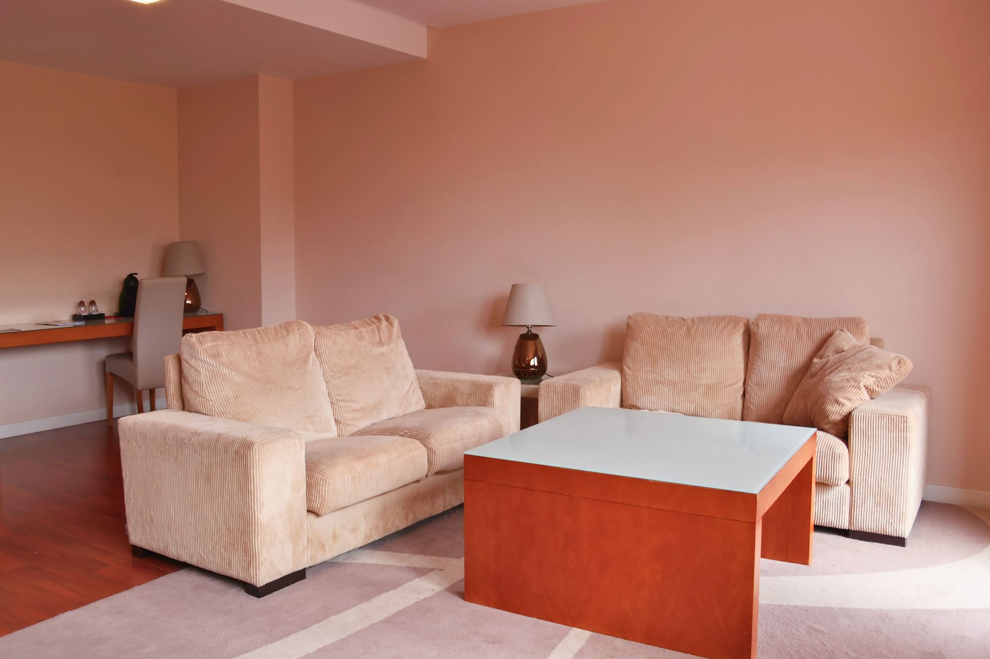 a living room with couches and a coffee table