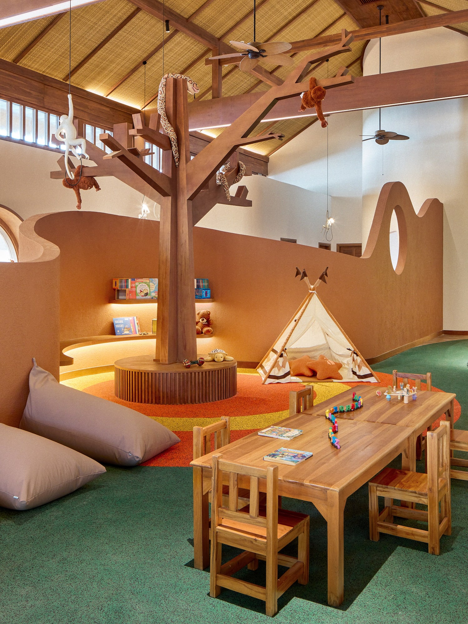 a room with a table and chairs and a tent