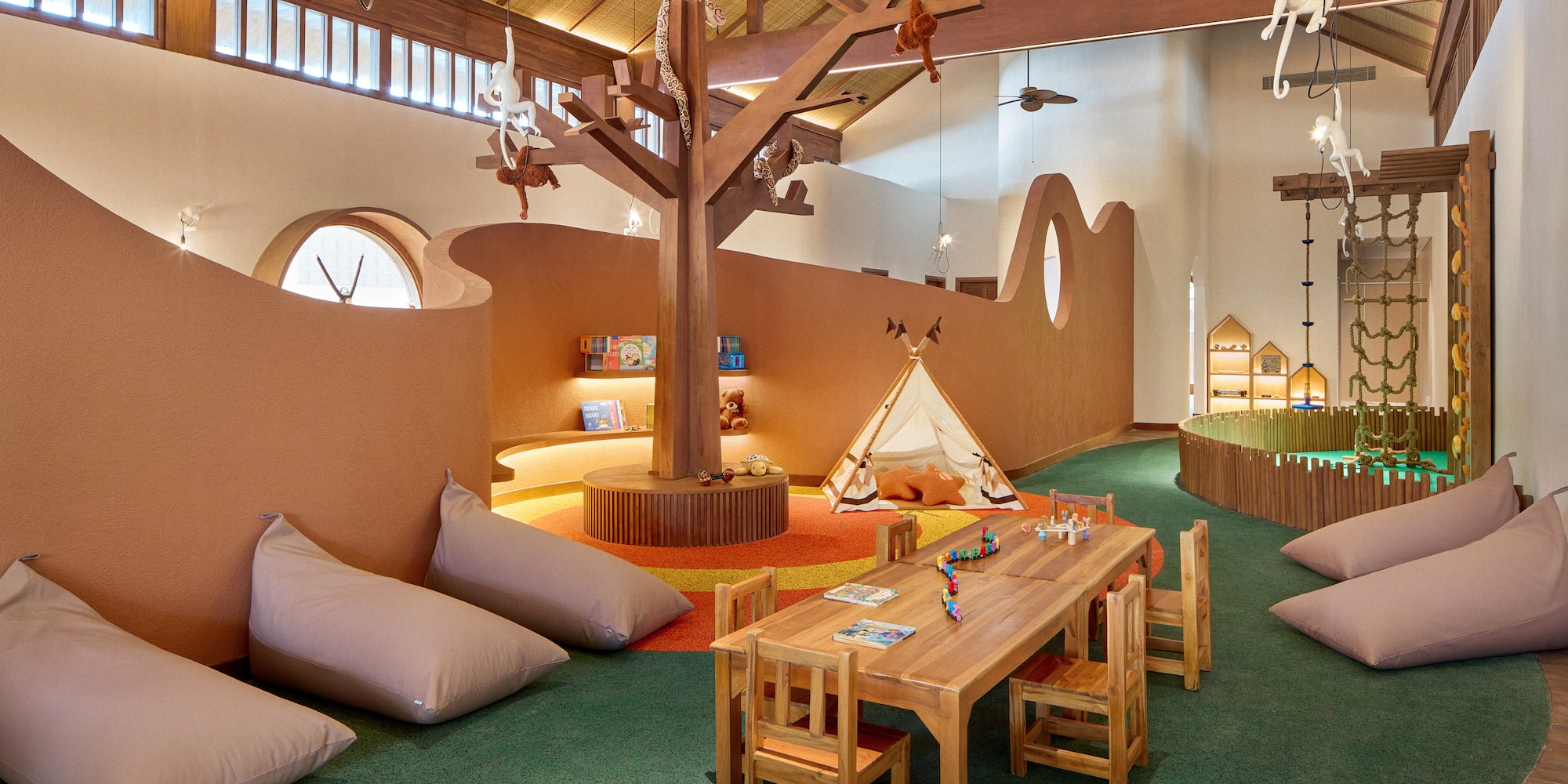 a room with a table and chairs and a tent