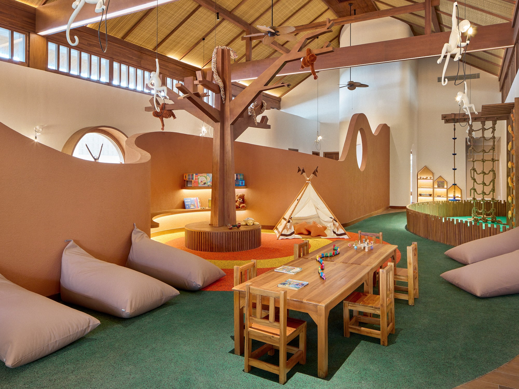 a room with a table and chairs and a tent