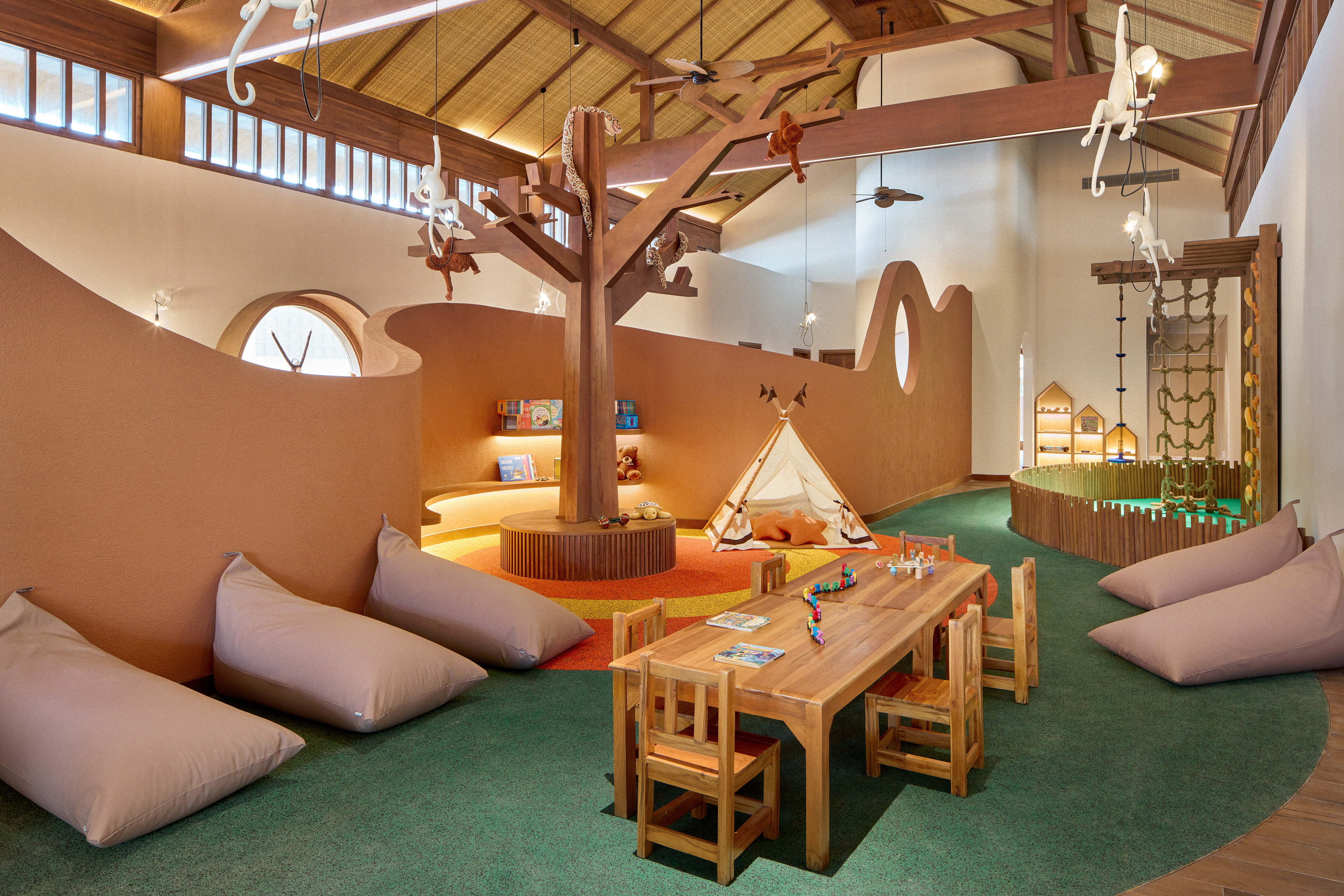 a room with a table and chairs and a tent