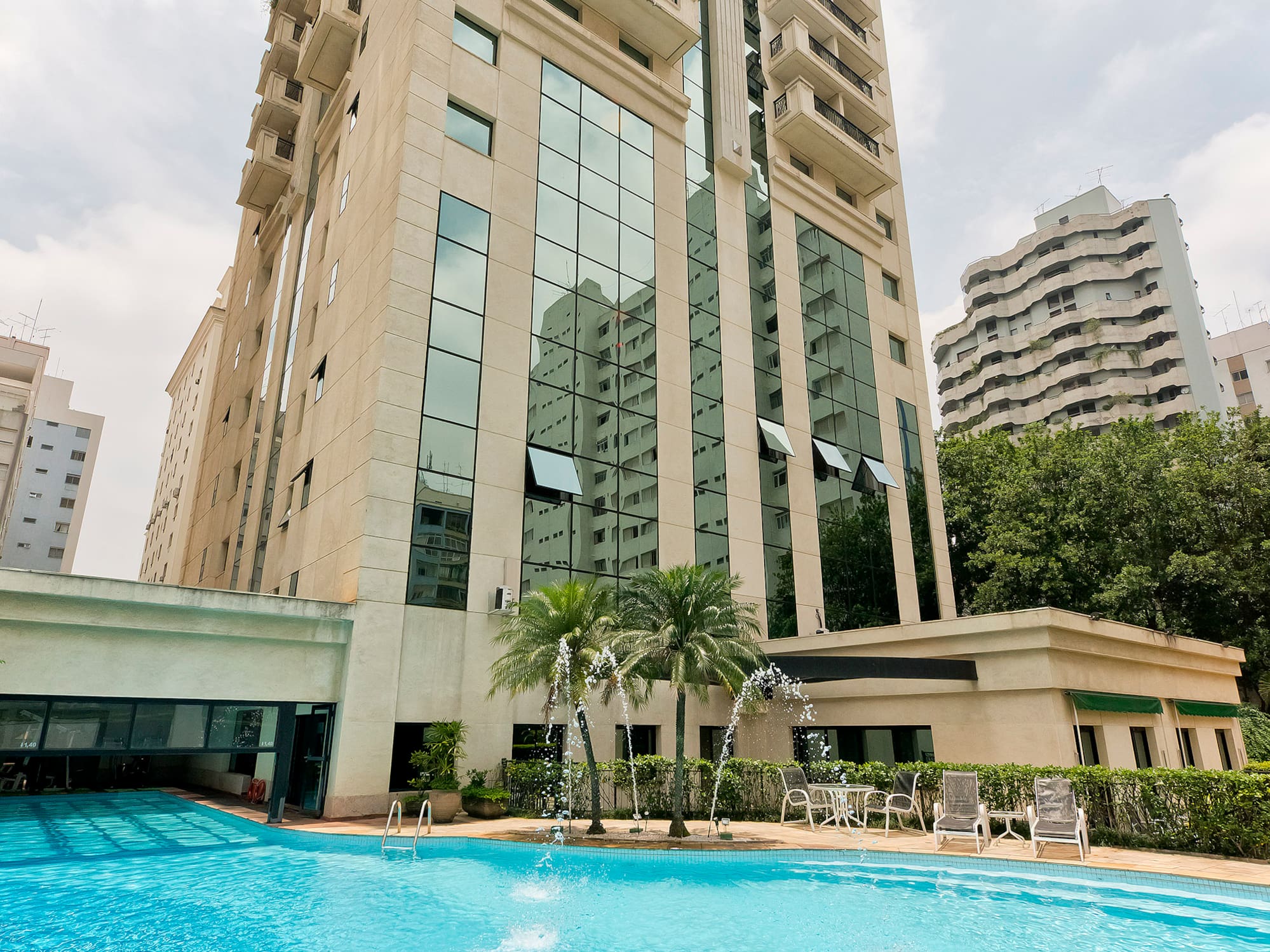 a pool in front of a building