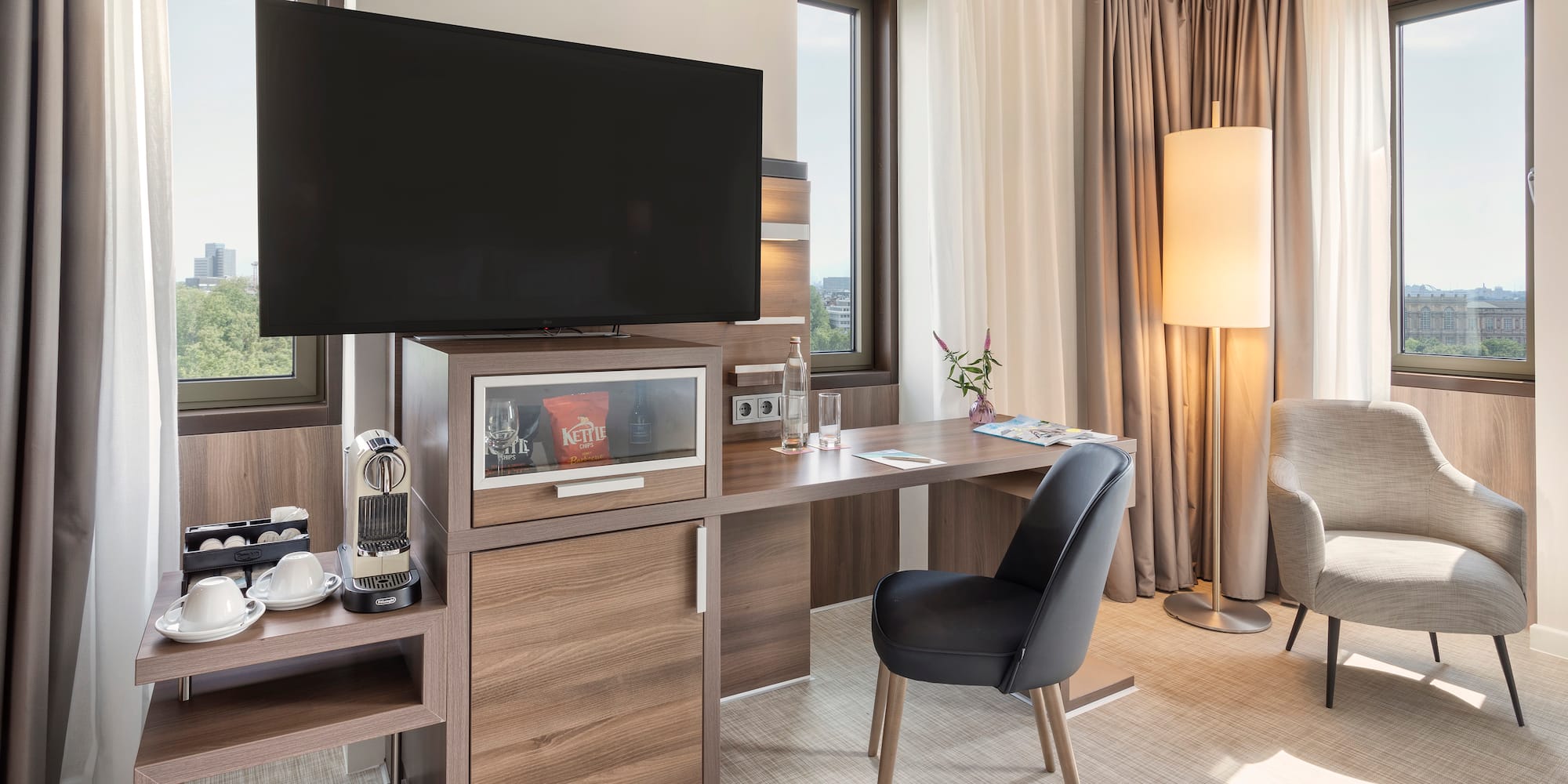 a room with a tv and a table