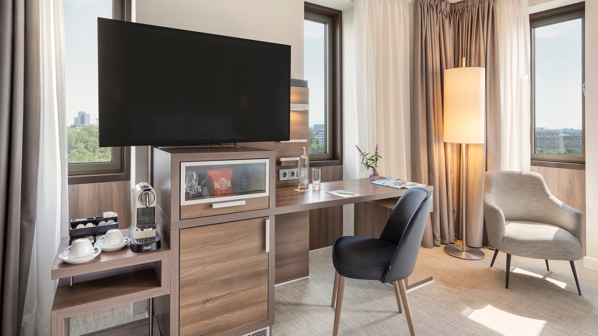 a room with a tv and a table