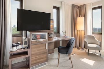 a room with a tv and a table