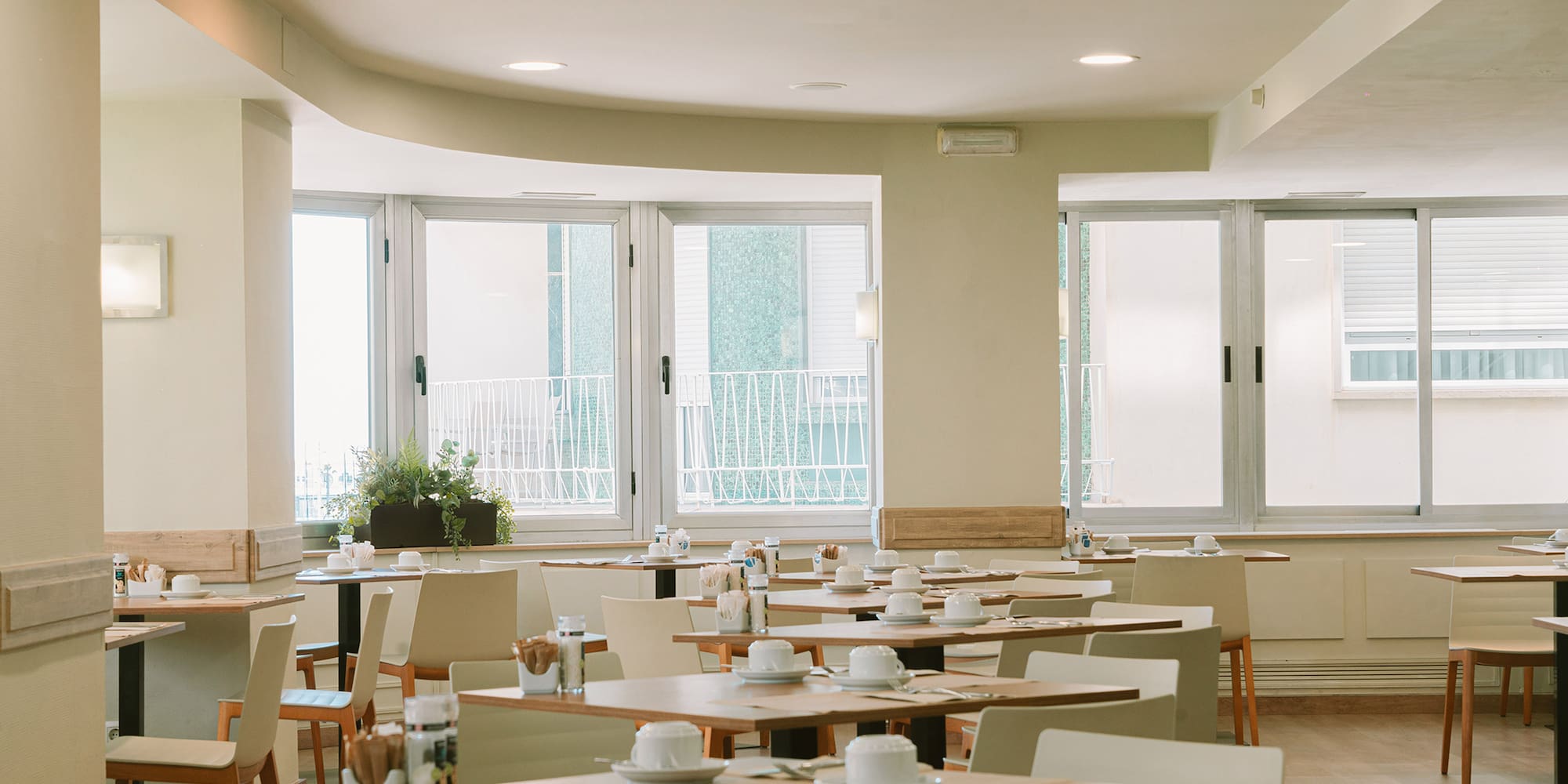 a room with tables and chairs