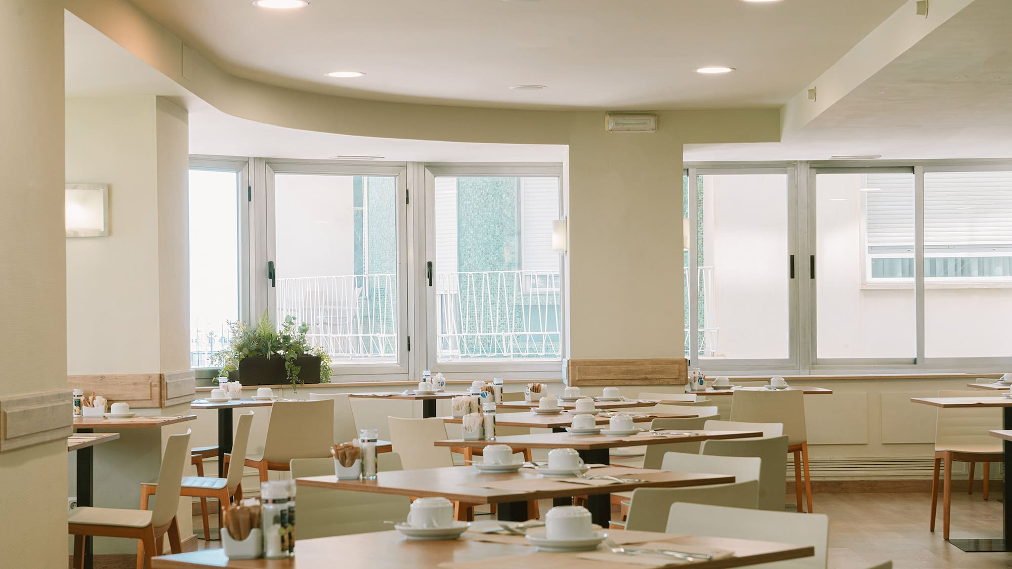 a room with tables and chairs