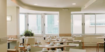 a room with tables and chairs