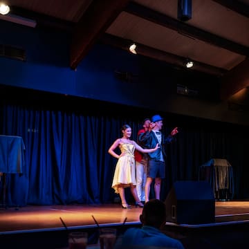 a group of people on a stage