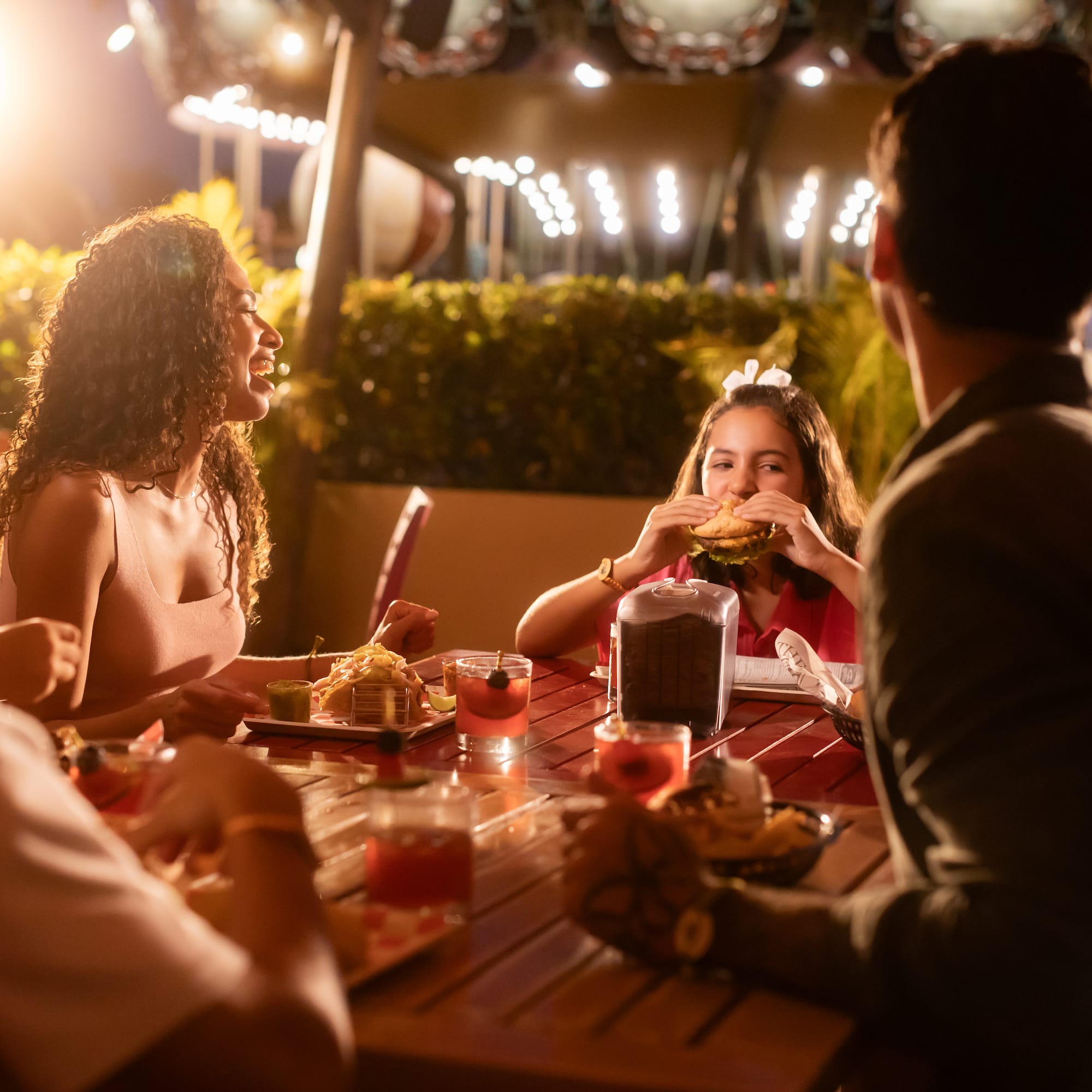 a group of people eating at a table