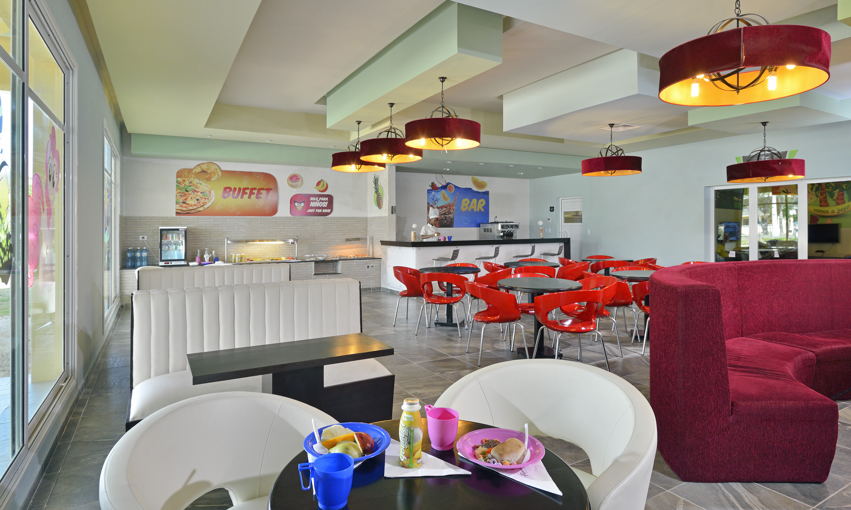 a room with tables and chairs