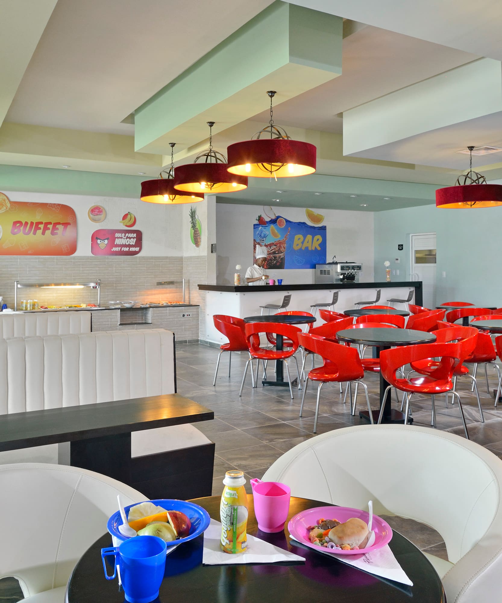 a room with tables and chairs